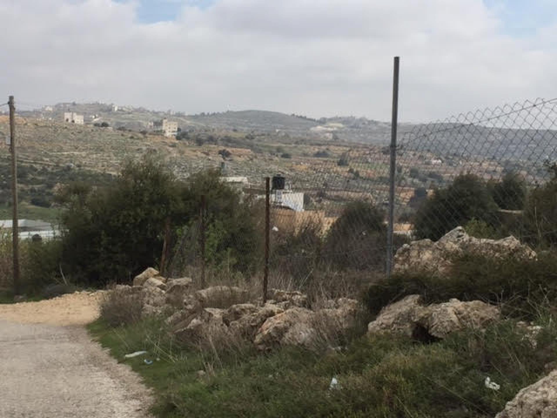 The road to the Harsina neighborhood photographed from area H1