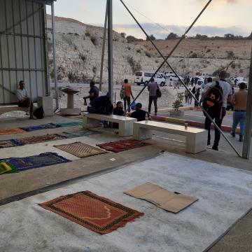 Checkpoint Barta`a: the waiting shed has become a prayer area