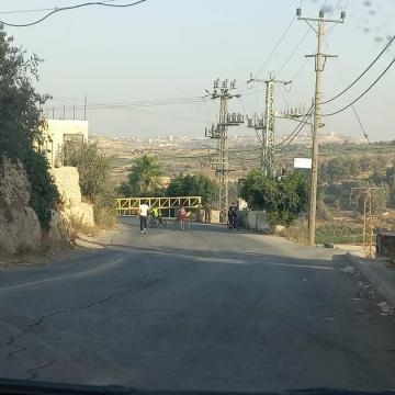 A checkpoint inside the village of Beit Omer