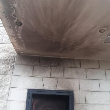 Asira al-Qibliya: the wall and ceiling of the balcony are charred