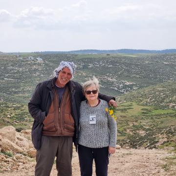 Fares and Smadar in Shweika. In the back you can see Eliashiv Nahum's Yehuda Farm and to the right the Yinon Levy Farm.
