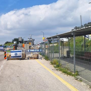 Kdumim: checkpoint and an Israeli flag checkpoint and an Israeli flag