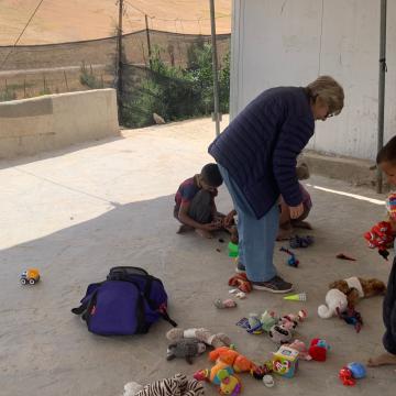 Umm Qusa - Smadar with Najeh' children and the toys